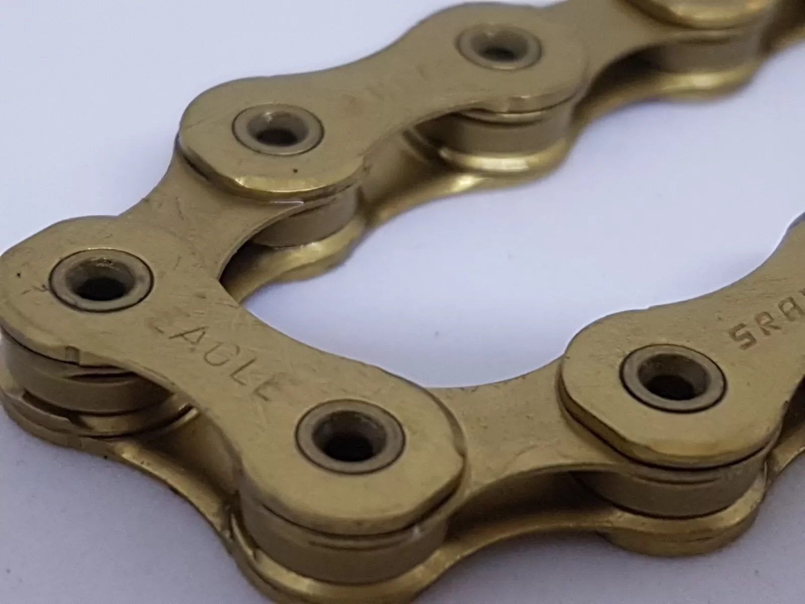 SRAM Eagle XX1 12 speed Chain Hollow Pin 126 Links - Gold Rainbow Black Copper - Image 9